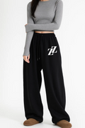 Baggy jogging noir logo